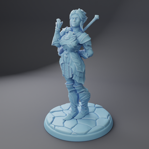 a blue statue of a woman holding a baseball bat