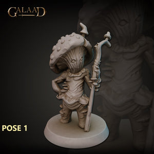a statue of an alien holding a sword