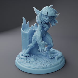 a blue figurine of a girl with a dragon on it