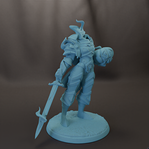 A 3D model of a warrior figure holding a sword and shield, standing on a base.