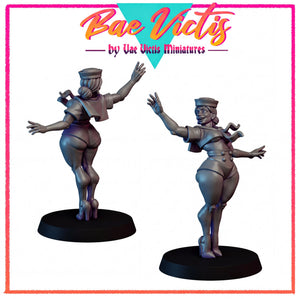 two female figures, one standing and one sitting, both wearing hats and standing on platforms.