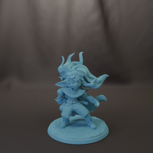 A figurine of a character with flowing hair and a flowing cape, standing on a base.