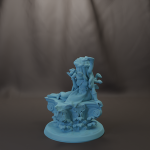 A light blue, sculptural figurine depicting a human figure with an abstract, organic shape.