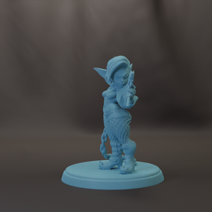 A small blue figurine of a person holding a weapon, standing on a blue base.