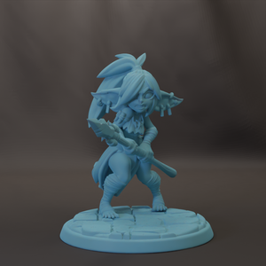 A figurine of a female character with a sword and a large headdress, standing on a platform.