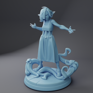 a blue statue of a woman with arms outstretched