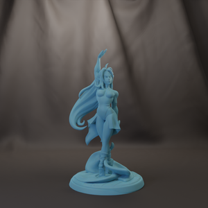 A figurine of a woman with long hair and a flowing skirt, standing on a pedestal.