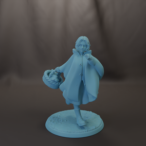 A light blue figurine of a person standing on a base, holding a basket and wearing a coat.