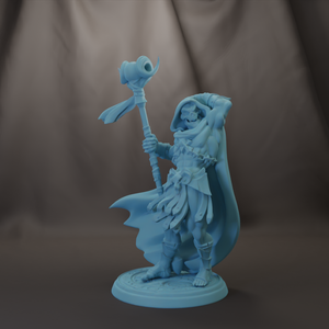 A figurine of a person holding a large hammer and wearing a cape-like garment.