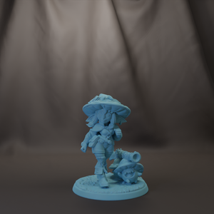 A figurine of a person wearing a hat and holding a weapon, standing on a base.