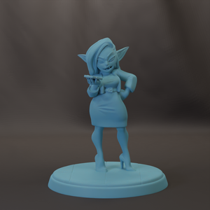 A light blue figurine of a woman with long hair and a dress stands on a circular base, holding a small object in her hand.