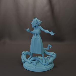 A figurine of a woman with a snake around her neck, standing on a platform.
