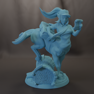 A blue statue of a woman with a large head and long hair, holding a sword and standing on a rock.