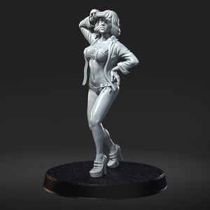 A 3D rendering of a female character in a bikini, standing on a platform and holding her hand up to her head.