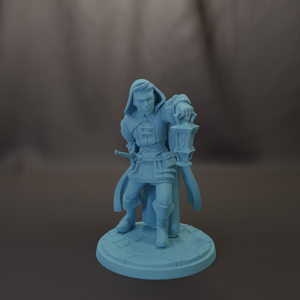 A figurine of a person holding a lantern, standing on a pedestal.