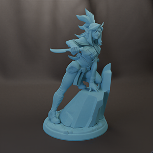 A 3D model of a female character with long hair and a headdress, holding a sword and standing on a rock.