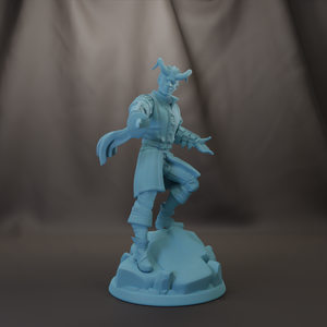 A figurine of a person with horns, wearing a long coat and standing on a rock.