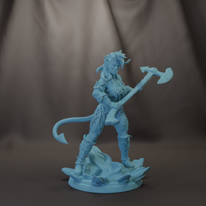 A figurine of a female character with horns and a tail, holding a large weapon and standing on a rocky base.