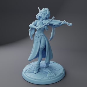 a figurine of a woman playing a violin