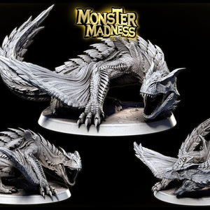 A 3D rendering of a large, detailed dragon sculpture with sharp teeth and claws, set against a dark background. The dragon appears to be in a fighting stance, with its mouth open and teeth bared. The text "MONSTER MADNESS" is prominently displayed above the dragon, indicating the title or theme of the image.