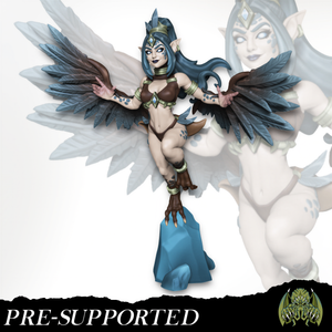 A figurine of a winged female character with blue hair and wings, wearing a brown outfit and standing on a blue rock.