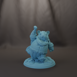 A light blue figurine of a person standing on a base, with a blurred background.