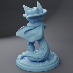 a blue statue of a woman with a hat