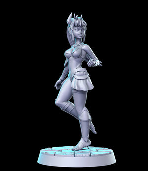 a statue of a woman in a silver outfit