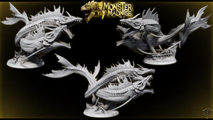 a collection of three detailed, intricate sculptures of fantastical creatures, likely inspired by the Monster Madness video game series. The sculptures are in various poses and angles, showcasing the creativity and skill of the artist.