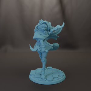 A light blue figurine of a character with a cape and hat, standing on a platform with a cracked surface.