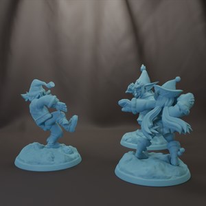three small figurines of people, each with distinct poses and expressions, set against a dark background.