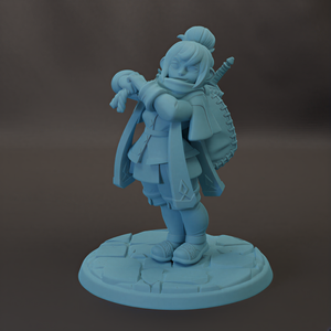 A light blue figurine of a person standing on a stone base, holding a sword and a shield.