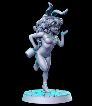 a statue of a woman with a cup in her hand