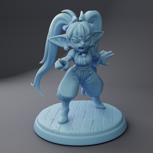 a blue figurine of a female character