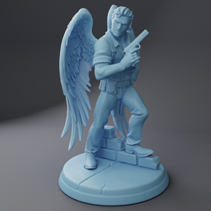 a statue of an angel holding a gun