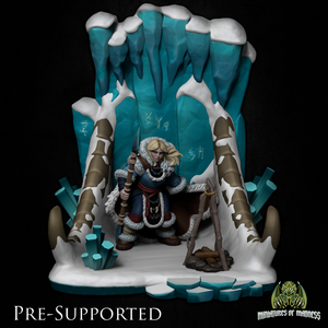 A 3D model of a fantasy character, likely a warrior or knight, standing in a snowy, icy environment with various elements such as crystals, rocks, and a cave-like structure. The character is holding a weapon and appears to be in a defensive stance.