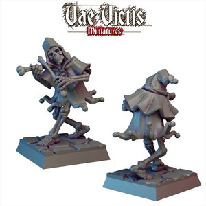 two 3D models of a skeleton character, one standing upright and the other in a crouched position, both wearing a hooded cloak.