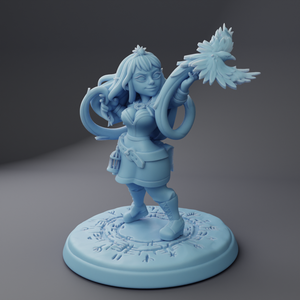 a figurine of a woman holding a snowflake