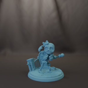 A small, light blue figurine of a skeleton holding a shield and a ball, standing on a base.