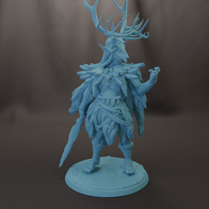 A figurine of a fantastical creature with antlers, a large head, and a flowing robe, standing on a base and holding a weapon.