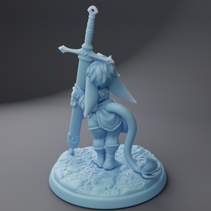 a figurine of a girl holding a sword
