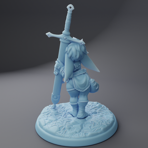 a figurine of a girl holding a sword