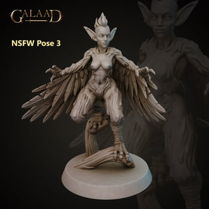 a statue of a female elf with wings