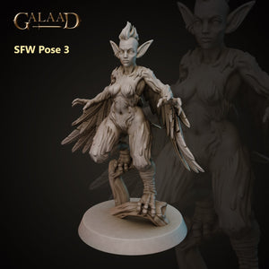 a statue of a female elf with wings