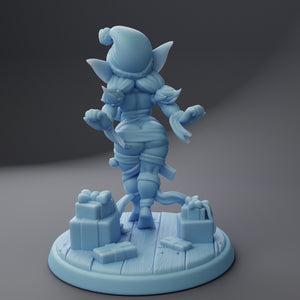 a blue figurine is standing on a table
